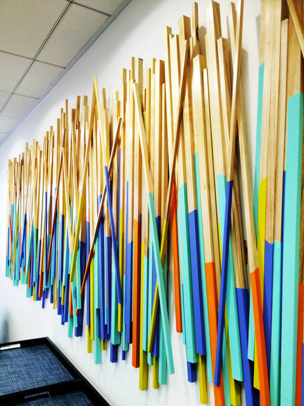 Painted wood stick wall sculpture